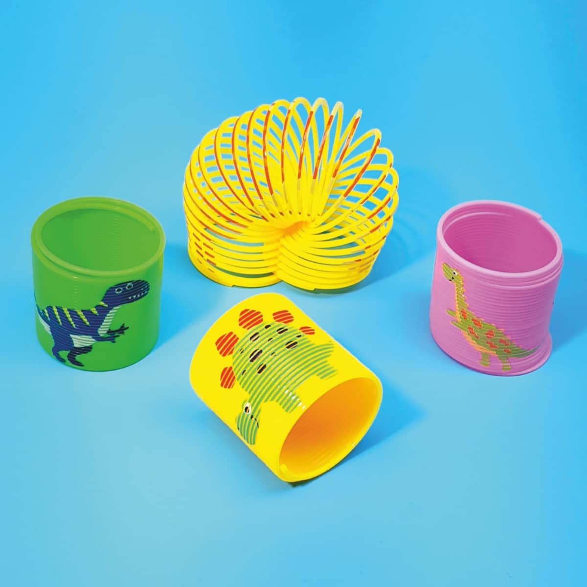 Mini-Spiralen Dino Treppenläufer Slinky Dinosaurier-Motive in bunten Farben