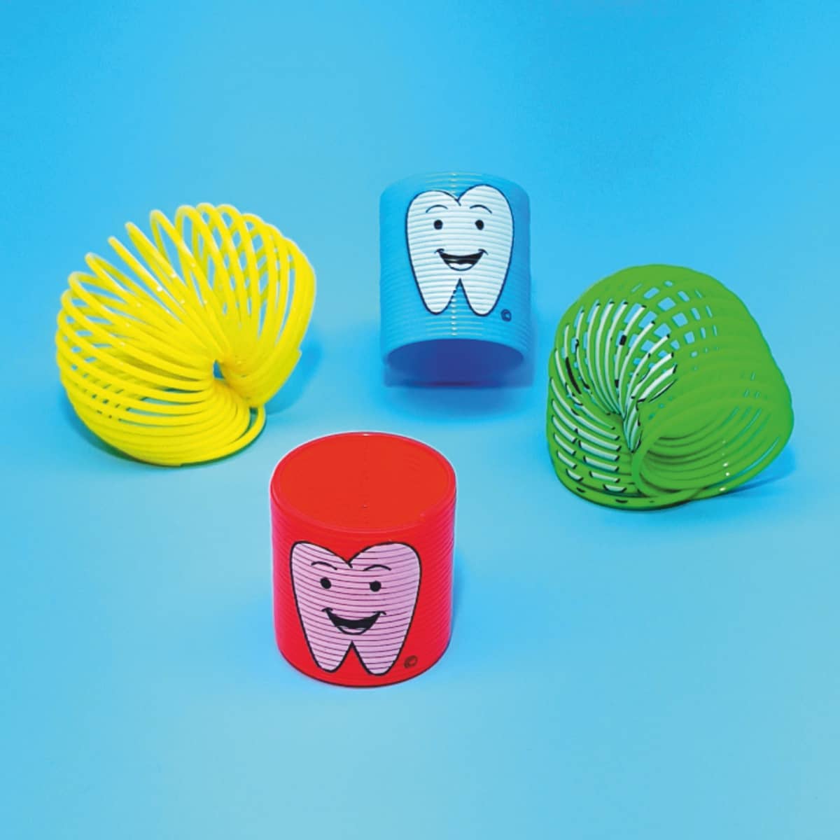 Mini-Spiralen Zähnchen Kleine Treppenläufer in bunten Farben mit Zahnmotiv