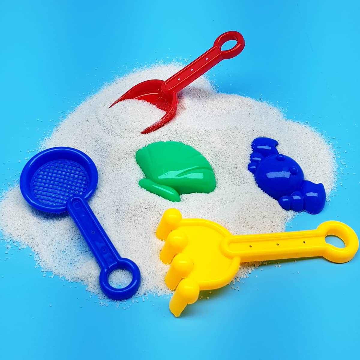 Kleine Sandförmchen im Beutel