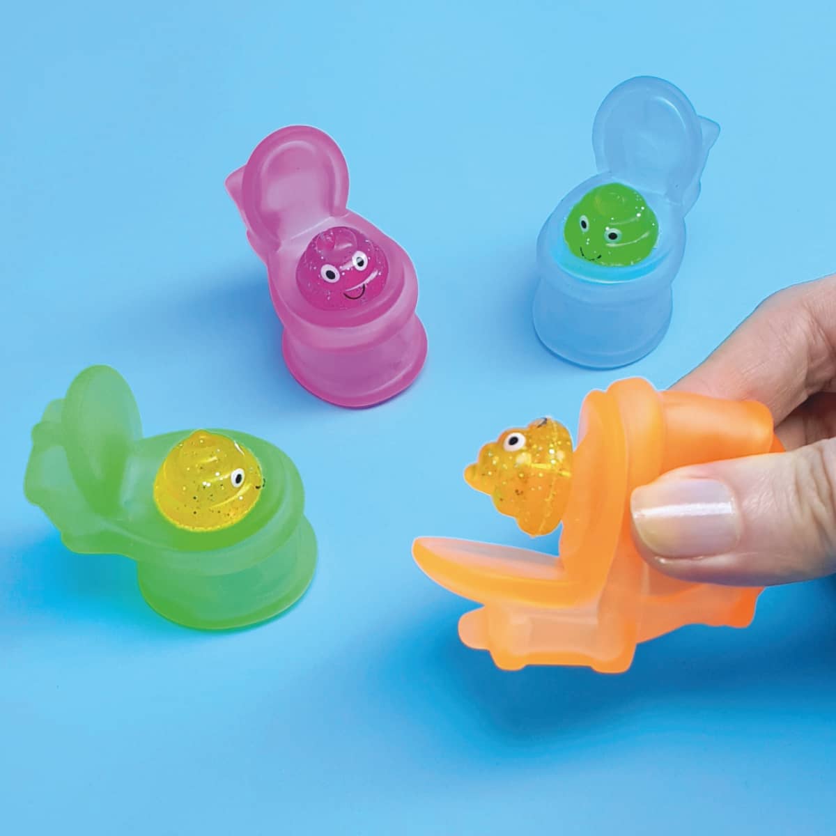 Quetsch-Toiletten Scherzartikel WC mit Glitzer-Häufchen