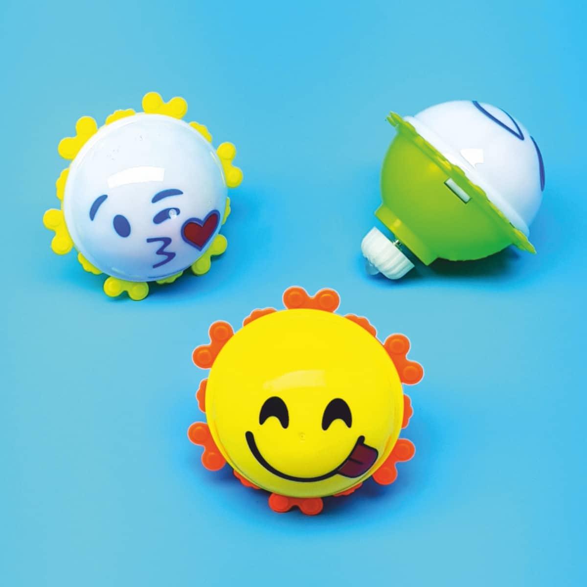 Leuchtende Smiley-Kreisel Emoji-Dreher mit LED-Lichter zum Aufdrehen