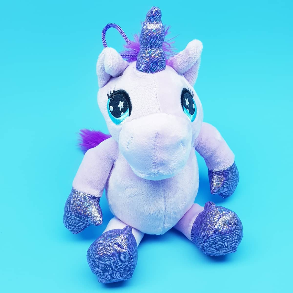 Plüsch-Einhorn Fantasy-Kuscheltier lila mit Glitzer