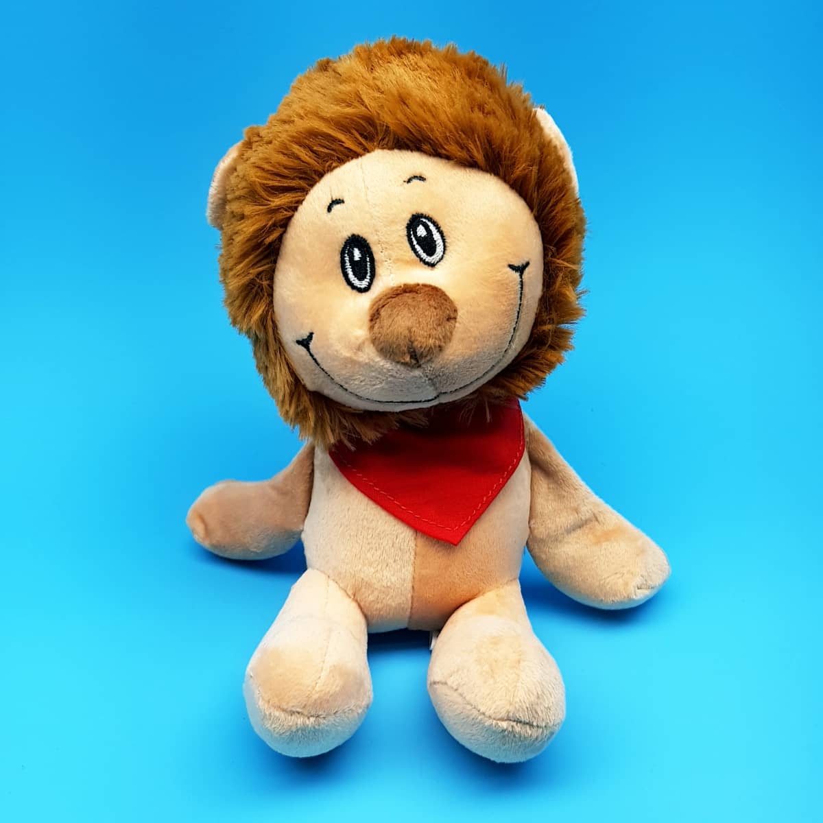 freundlicher Kuschel-Löwe mit Halstuch